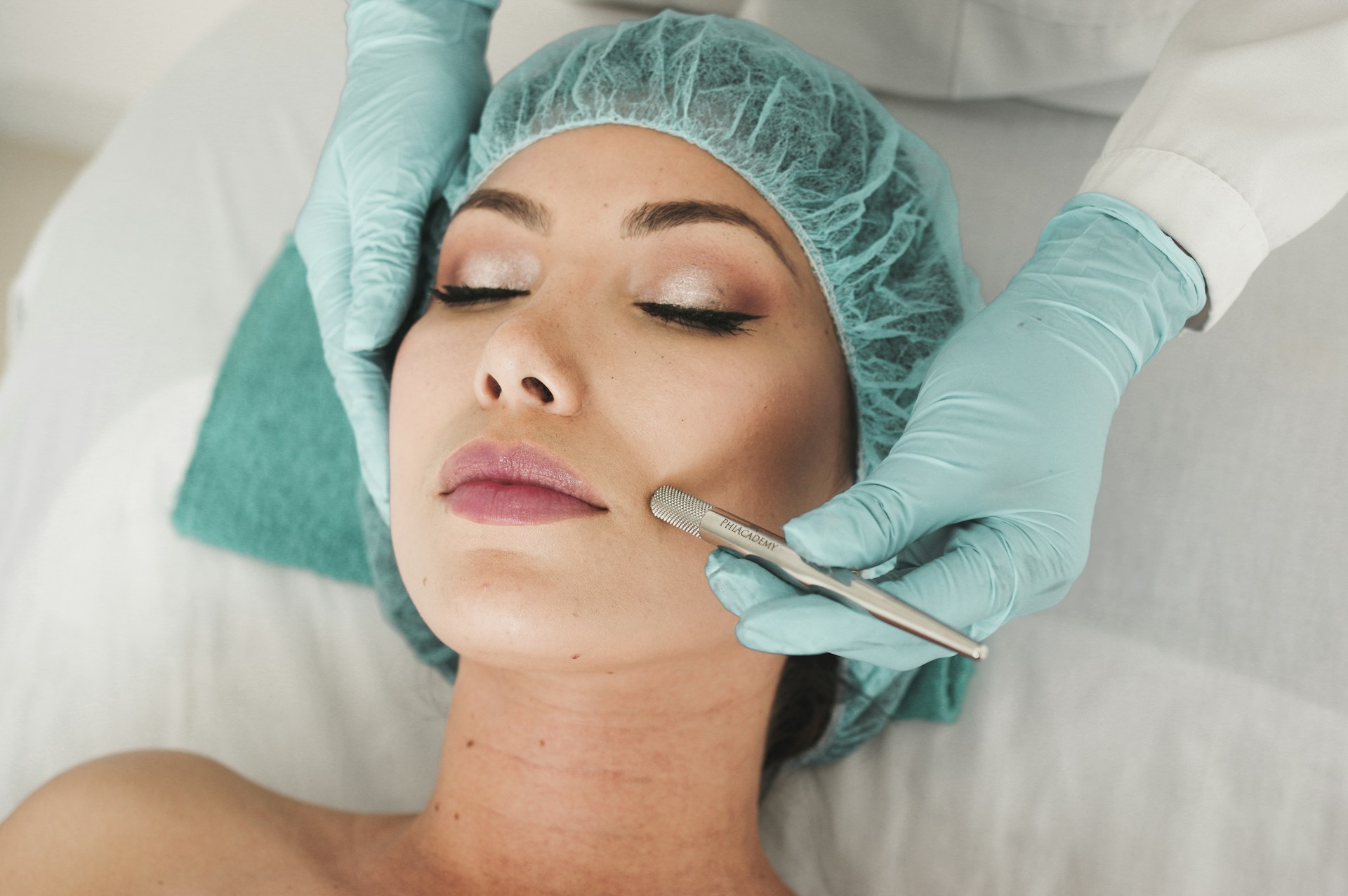 Gloved aesthetician performing a precision facial treatment at an independent MedSpa, the kind of provider-specific expertise that AI search engines cite over generic chain clinic listings